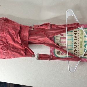 Dusty pink ripped overalls